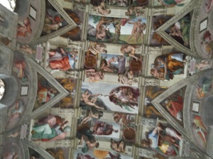 The Sistine Chapel ceiling of Michelangelo - Note the panels of the creation of Adam, the creation of Eve, and the casting from the Garden
